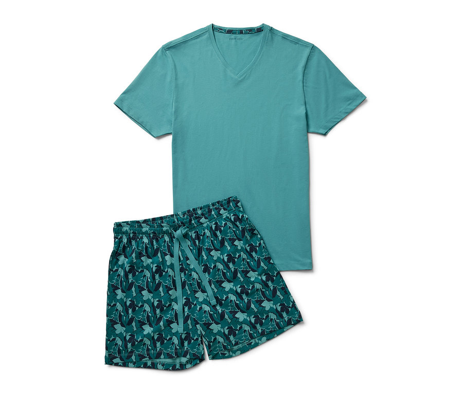 Ein türkis-farbenes Shorty-Pyjama-Set bestehend aus einem T-Shirt mit V-Ausschnitt und Shorts mit einem grünen Blätterdruck.