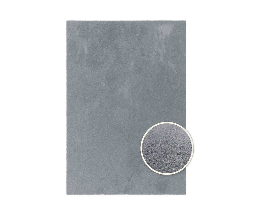 Grauer Teppich »Mellow« in verschiedenen Größen, Detailaufnahme der Teppichstruktur in einem Kreis.