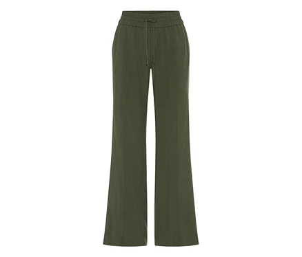 Olivgrüne weite Hose mit elastischem Bund und Kordelzug.