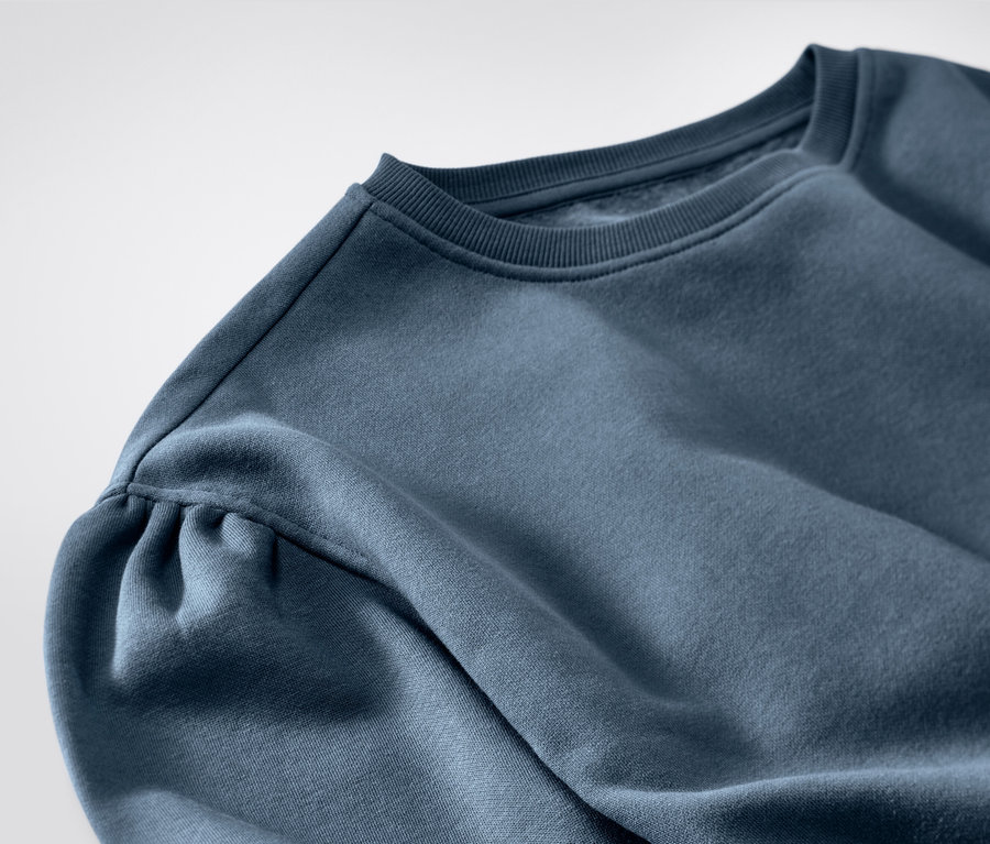 Detailaufnahme eines Kinder-Sweatkleids.
