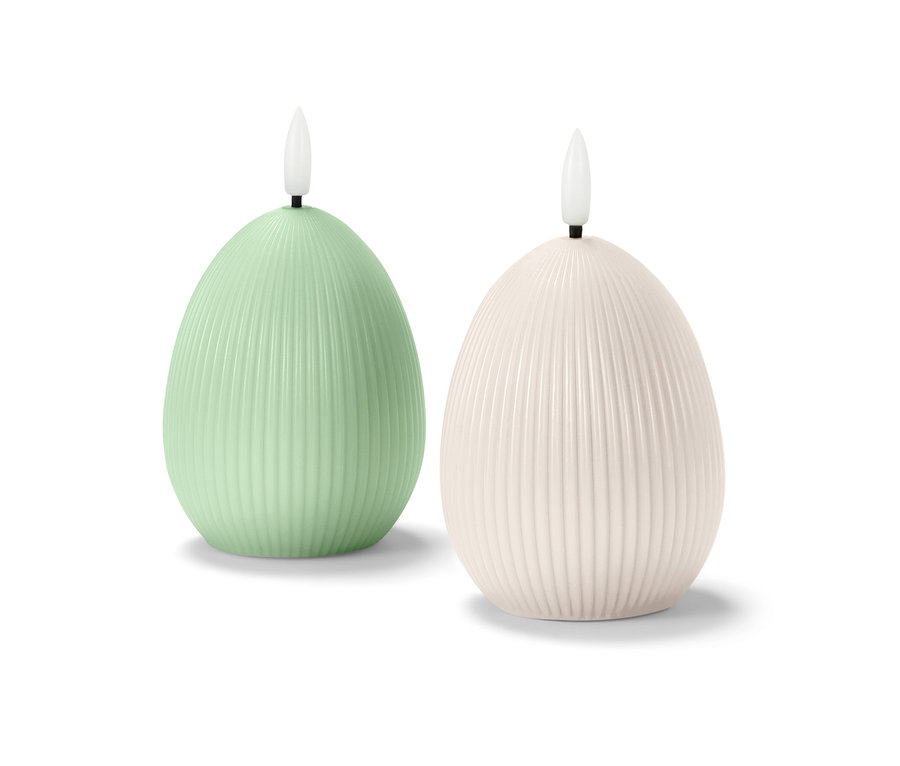 Zwei LED-Echtwachskerzen in Eiform.