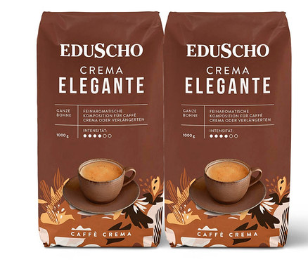 Zwei braune Packungen Eduscho Crema Elegante Kaffee mit einer Tasse Kaffee.
