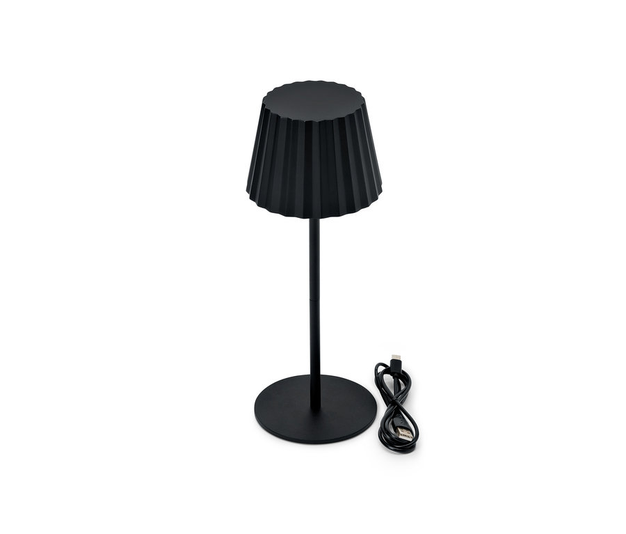 Eine kleine schwarze LED-Tischleuchte mit Kabel.