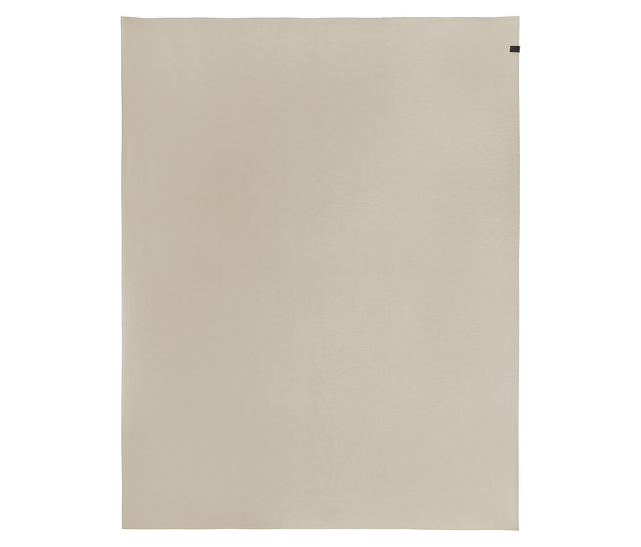 Sandfarbene SCHÖNER WOHNEN-Kollektion Tischdecke mit kleinem schwarzem Etikett oben rechts.