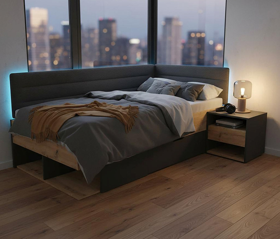 Graues Roba Jugendbett »Marvin«, 90 x 200 cm, mit Decke und Kissen steht vor einem Fenster in einem Schlafzimmer.