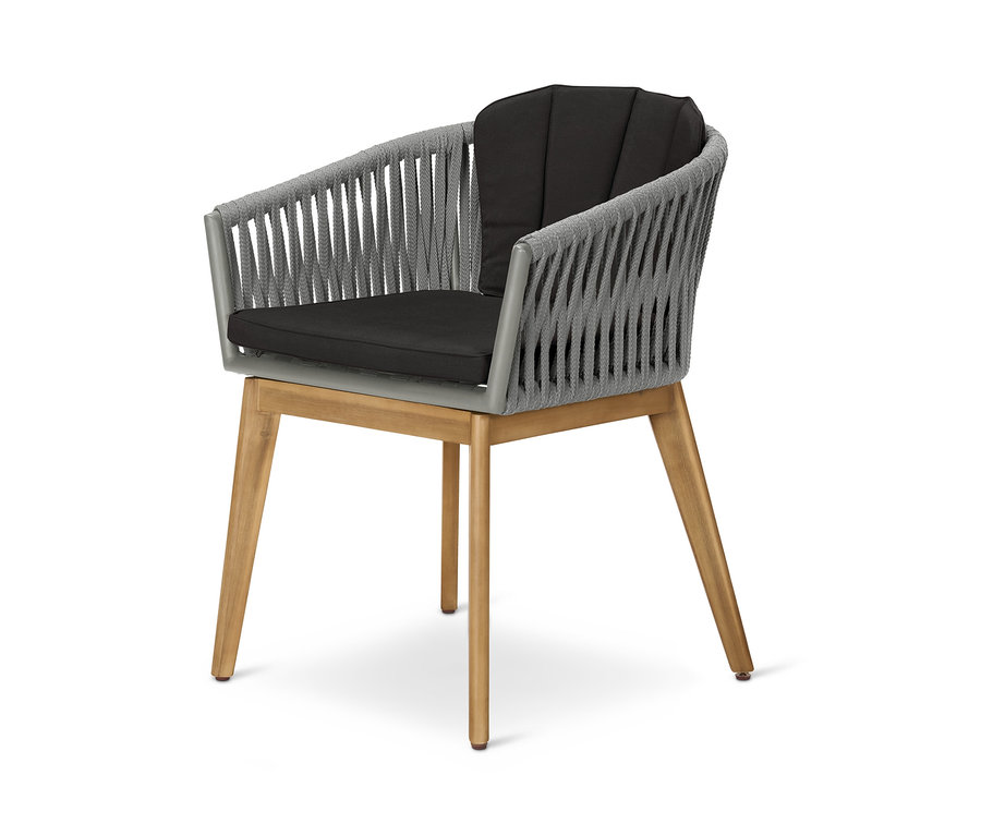 Detailaufnahme eines Dining-Sessels mit Textilgeflecht und schwarzer Polsterung.