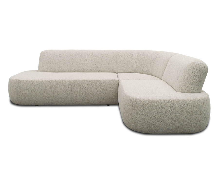 Ein cremefarbenes, modulares Ecksofa mit Bouclé-Bezug.