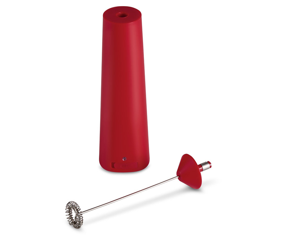 Ein roter, wiederaufladbarer Akku-Milchaufschäumer mit abnehmbarem Quirl.