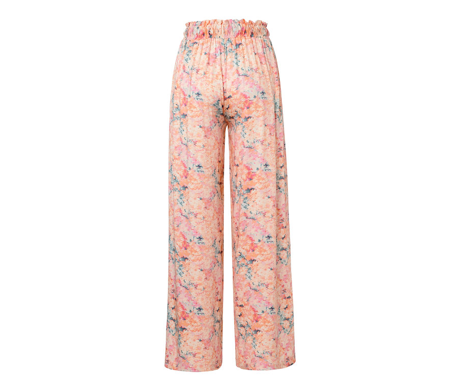 Aprikotfarbene Relaxhose mit Blumenmuster.