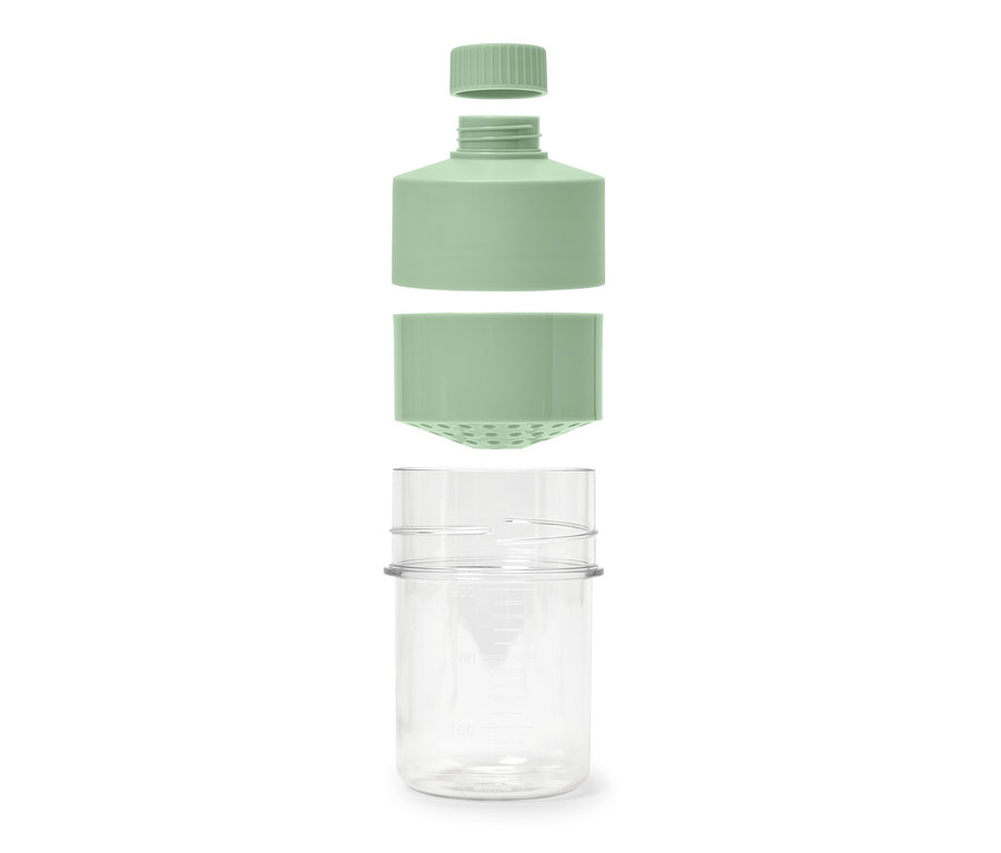 Eine zerlegte Dressingflasche mit Deckel und Behälter.