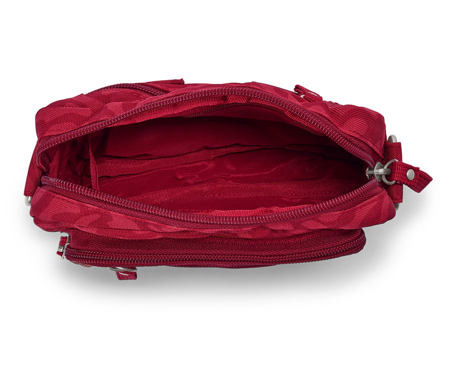 Nahaufnahme einer offenen, leeren, roten Handtasche.