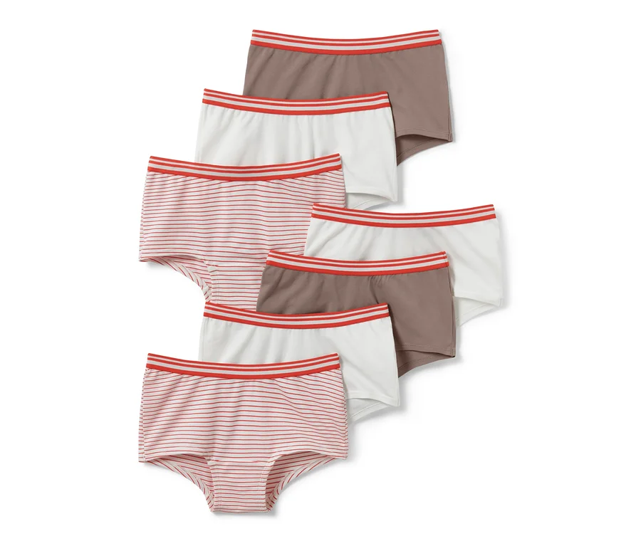 Sieben Kinder-Pantys: gestreift, braun und weiß, mit einem roten Streifen am Bund.