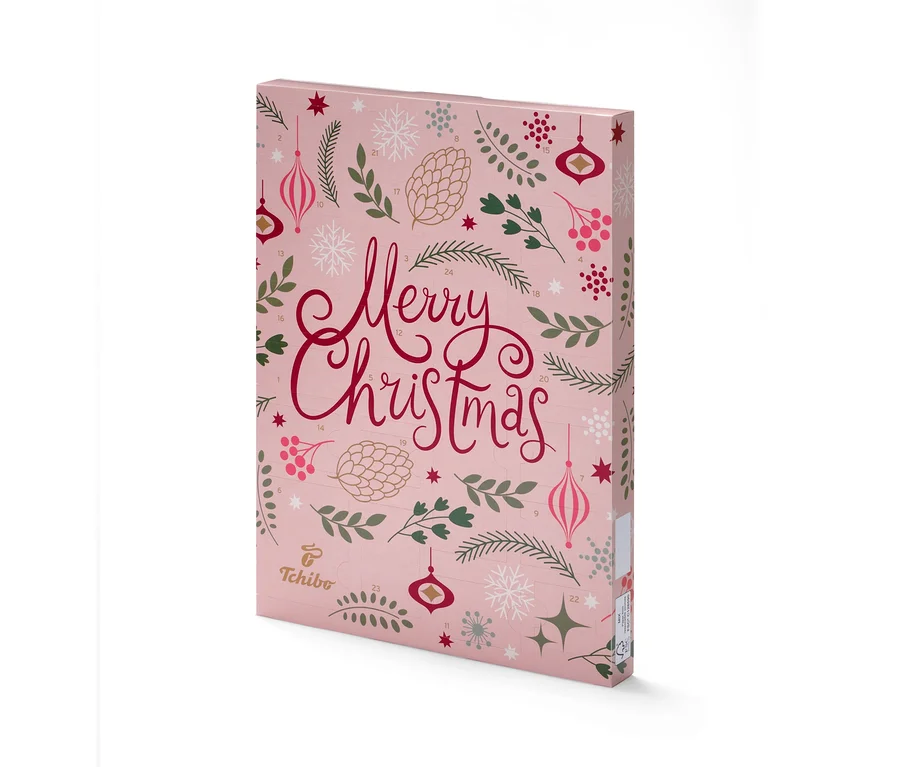 Rosa Tchibo-Adventskalender mit der Aufschrift Frohe Weihnachten und Zahlen.