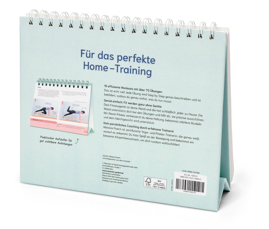 Auf einem Tisch liegt ein aufgeschlagenes Buch mit dem Titel "Für das perfekte Home-Training".