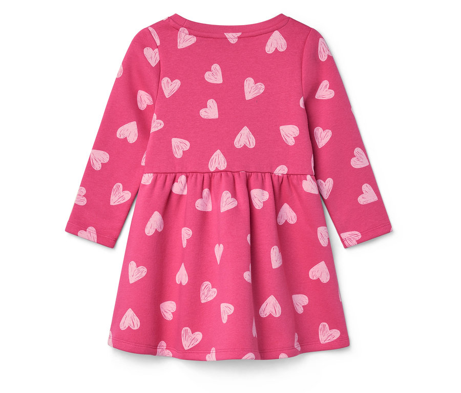 Rosa Kleid mit langen Ärmeln und weißen Herzchen-Print.