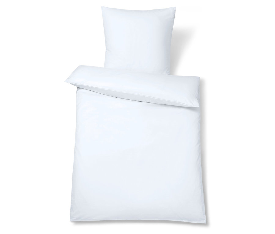 Weiße Kissen- und Bettdecke.