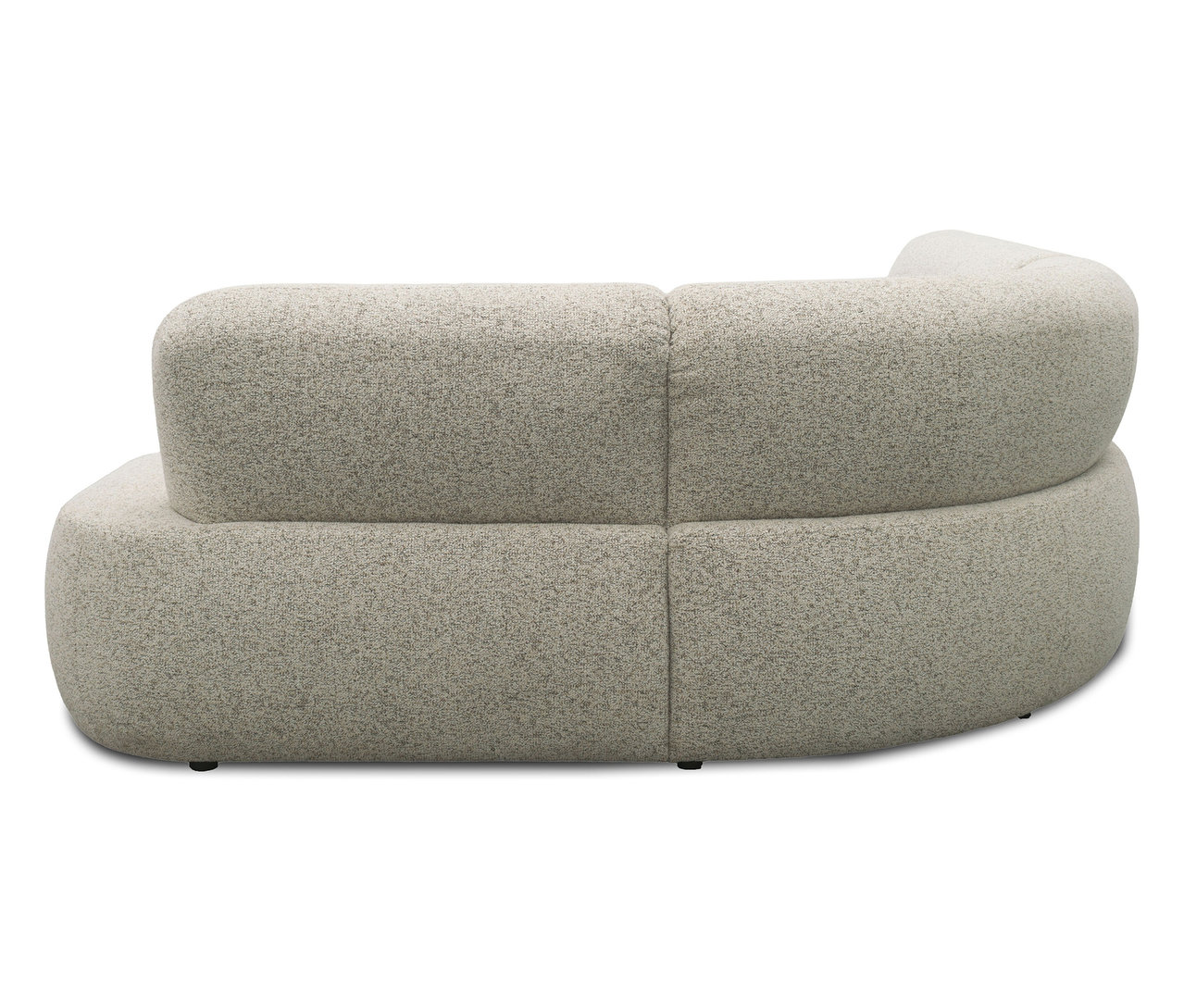 Beiges, abgerundetes modulares Sofa, von der Seite fotografiert.