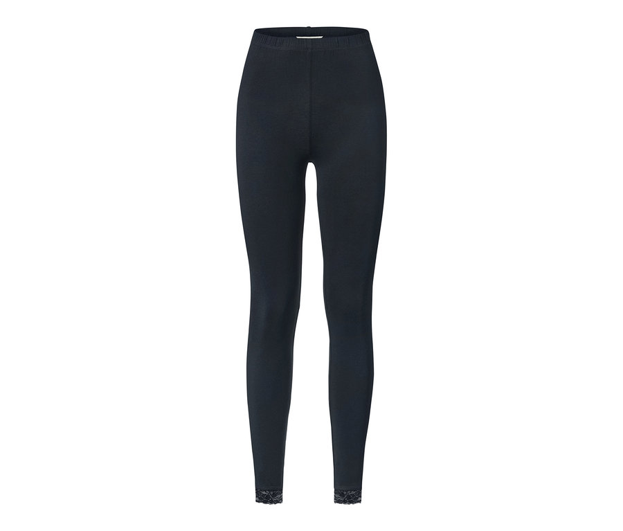 Schwarze Leggings mit Spitzenborte.