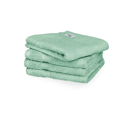 Stapel aus 4 salbeigrünen SCHÖNER WOHNEN-Kollektion #Cuddly# Handtüchern.