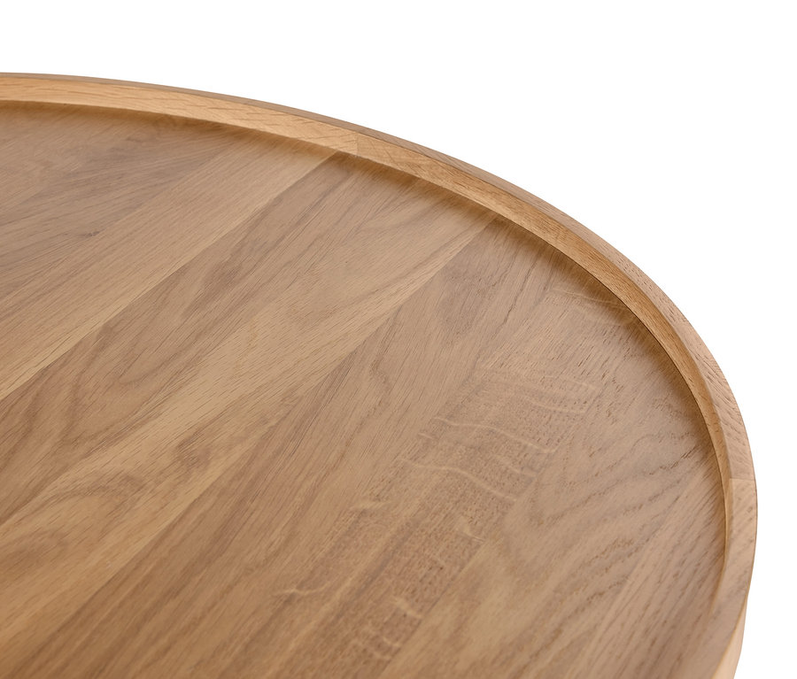 Detailansicht eines runden Couchtischs.