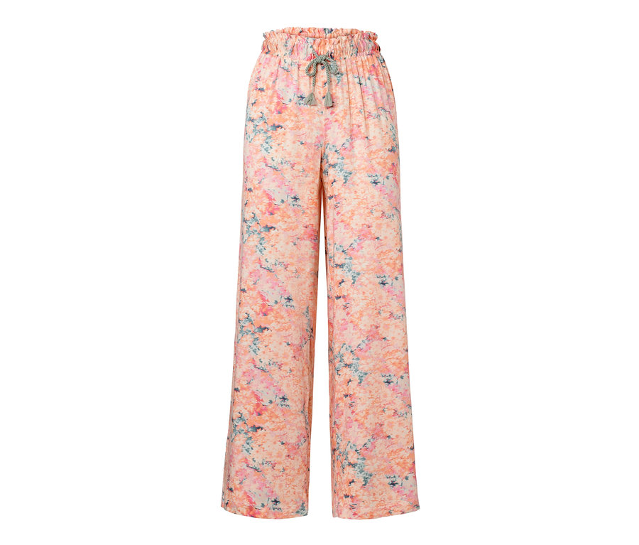 Aprikotfarbene Relaxhose mit Blumenmuster.