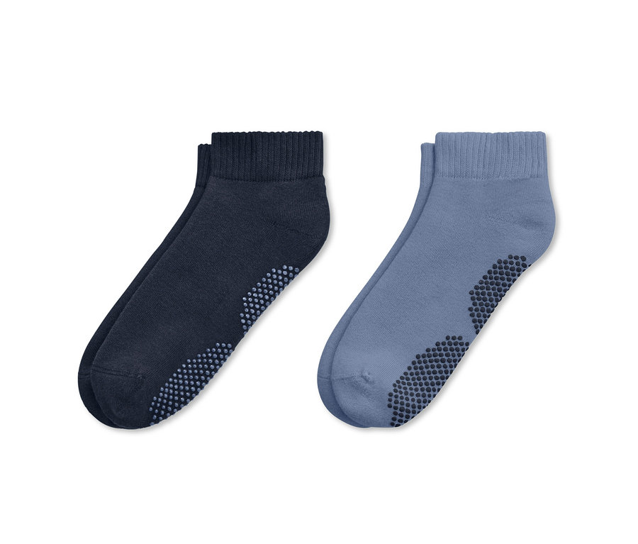 Zwei Paar blaue und marineblaue Yogasocken.