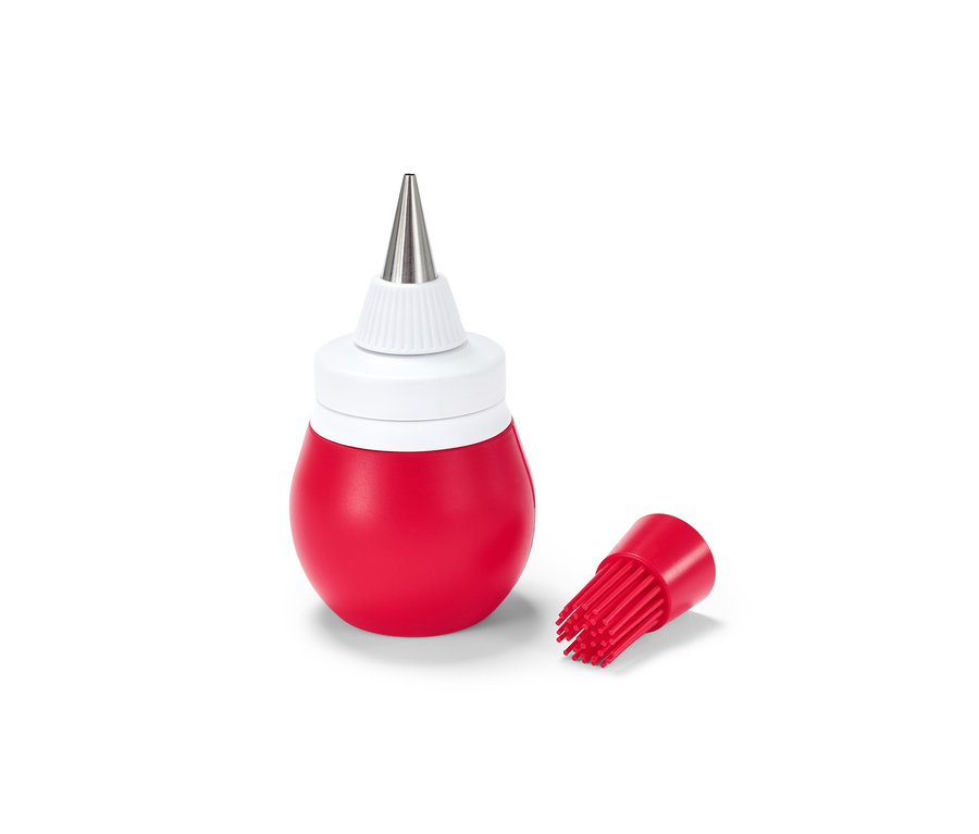 Eine rote 2-in-1-Dekorierflasche mit Edelstahlspitze und Silikonpinsel.