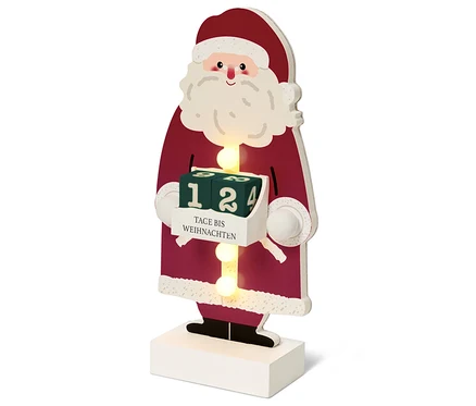 Eine hölzerne Weihnachtsmann-Figur mit Adventskalender.
