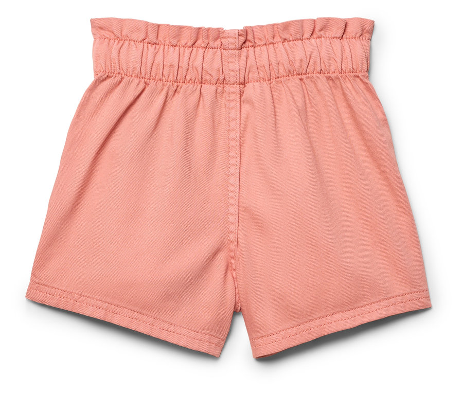 Nahaufnahme von korallenroten Shorts mit elastischem Bund.