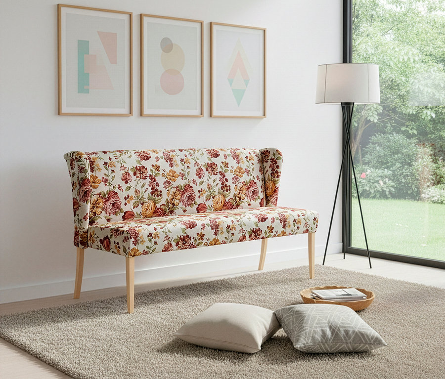 Eine Polsterbank »Hendrick« mit floralem, beigen Muster steht im Raum.