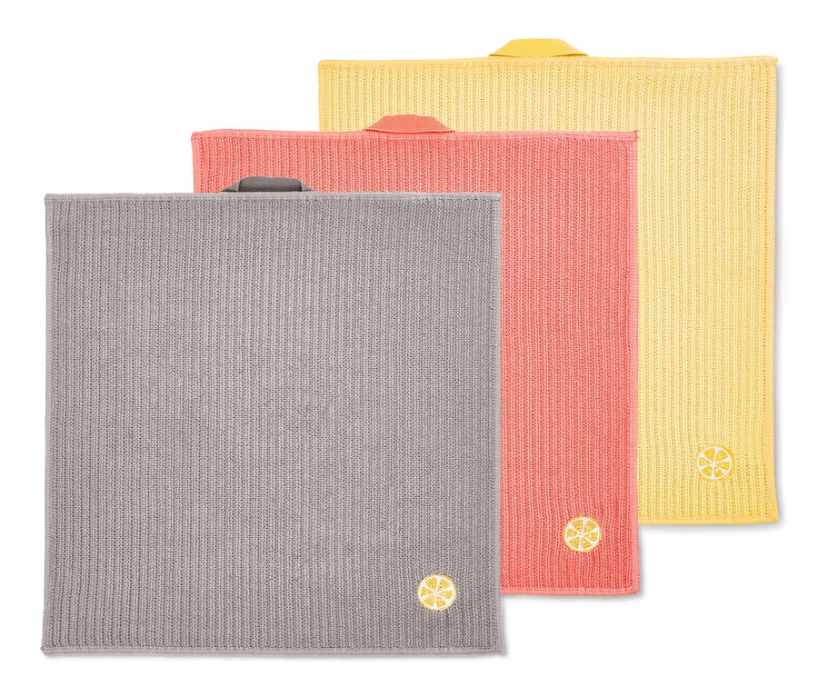 Drei Universal-Reinigungstücher in Grau, Lachsfarben und Gelb mit aufgesticktem Zitronenmotiv.