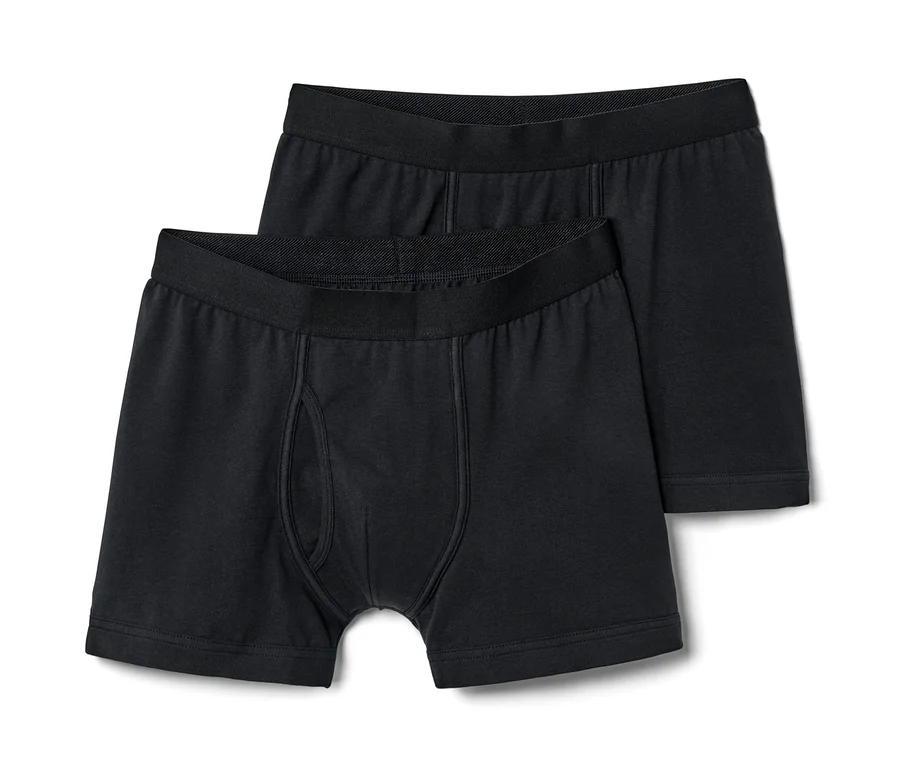 Zwei schwarze Slipboxer mit Eingriff liegen übereinander.