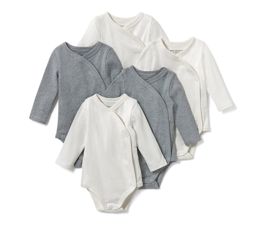 Fünf Baby-Langarmbodys in Grau und Weiss.