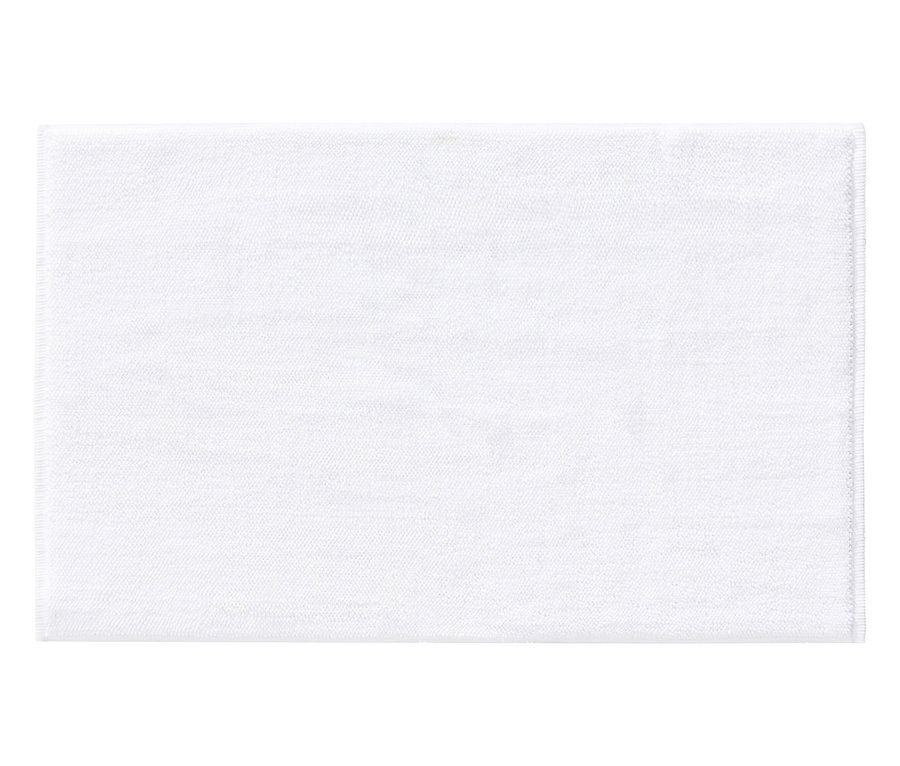 Ein einzelnes, rechteckiges, weißes Tuch liegt flach.