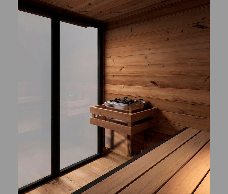 Sauna-Innenraum mit hellen Holzwänden, Decke und Boden. Eine Holzbank befindet sich rechts. Ein Saunaofen mit dunklen Steinen steht in einem Holzrahmen an der Wand, neben einem großen Milchglasfenster.