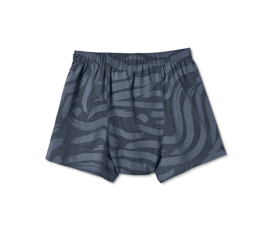 Eine blaue 2 Webboxershorts mit Alloverprint.