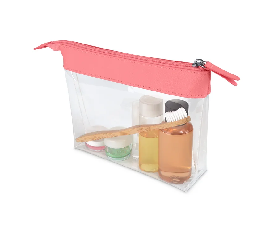 Eine durchsichtige Handgepäck-Kosmetiktasche mit rosa Reißverschluss und Inhalt.