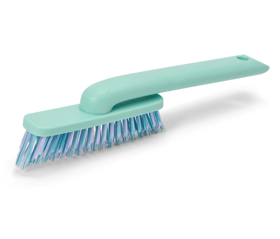 Türkise Bodenbürste mit lila Borsten.