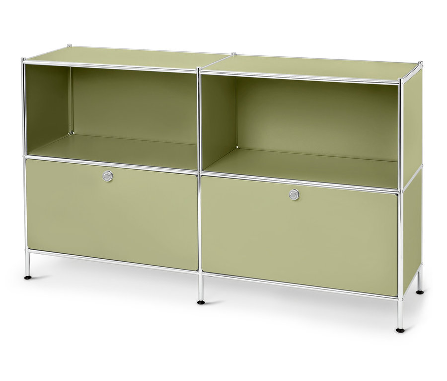 Grüner Schrank mit Chromrahmen und zwei offenen Regalen über zwei Schubladen.