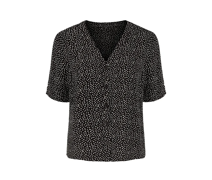 Eine schwarze Bluse mit weißem Aufdruck.