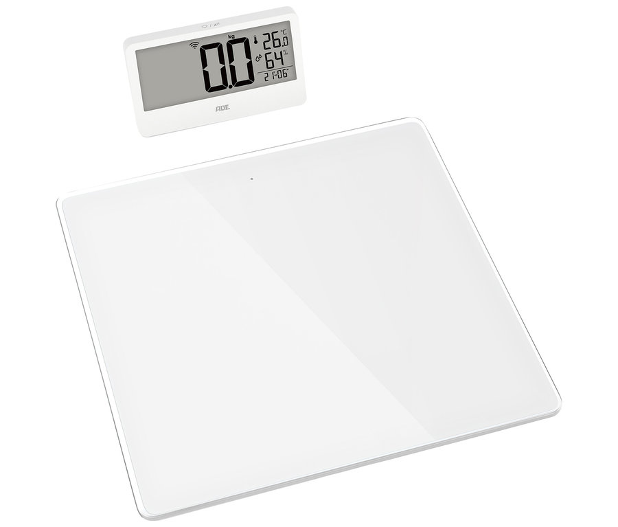 Weiße digitale Personenwaage mit separatem Display, das 0,0 kg, 26,0 °C, 64 % Luftfeuchtigkeit und 21:06 Uhr anzeigt.