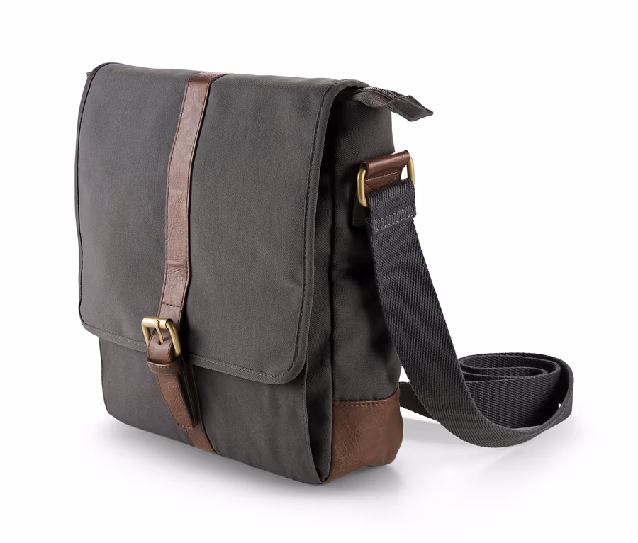 Graue Crossbag mit braunen Lederakzenten.