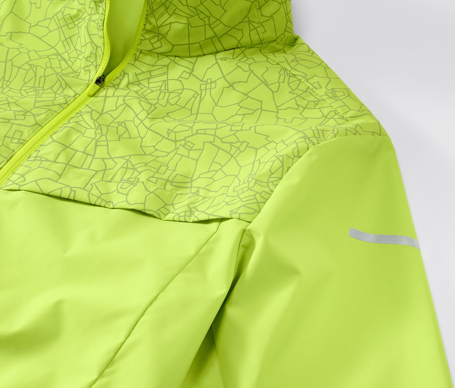 Detailansicht der neonlime Windprotection-Laufjacke.