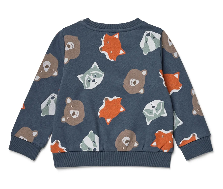 Blauer Pullover mit Tiermuster.