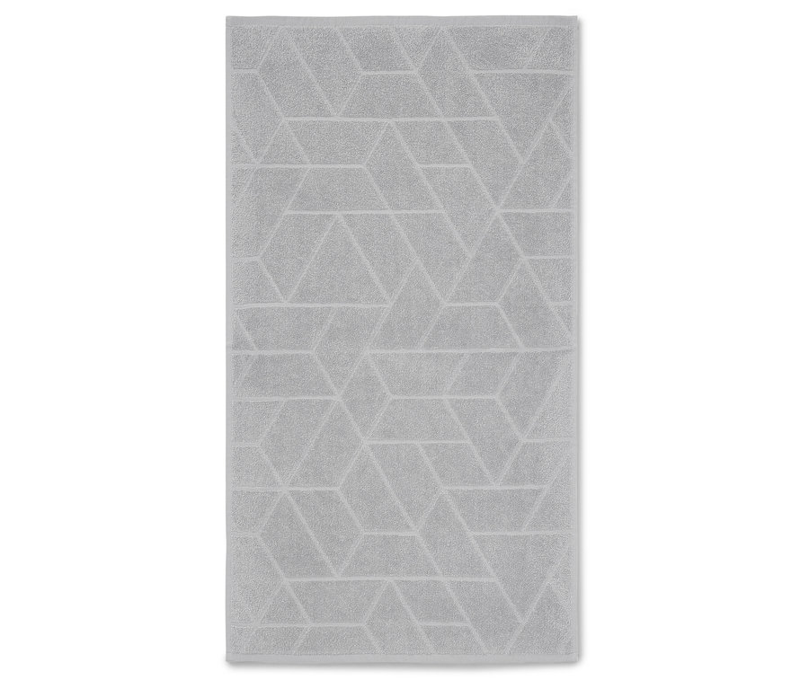 Graues Handtuch mit geometrischem Muster.