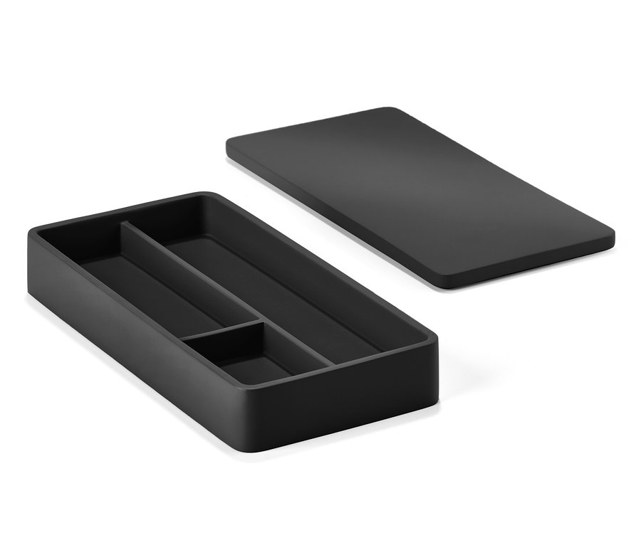 Eine schwarze ZONE DENMARK Aufbewahrungsbox mit einem Deckel daneben.