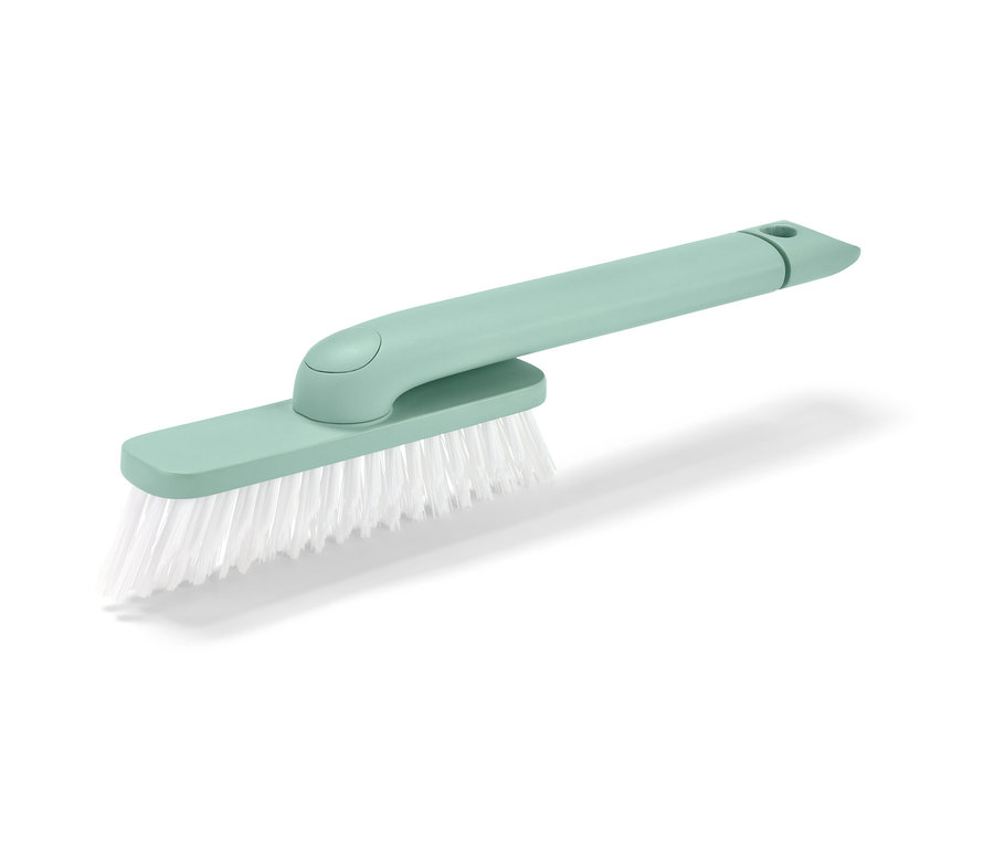 Ein grüner 4-in-1-Fugenmeister mit weißen Borsten auf einem weißen Hintergrund.