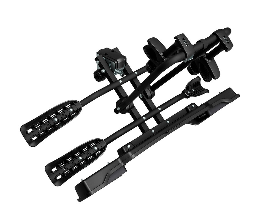 Ein schwarzer, klappbarer Fahrradträger für zwei Fahrräder, mit zwei unteren Radschienen und zwei oberen Haltearmen mit Rahmenklemmen, schräg vor weißem Hintergrund.