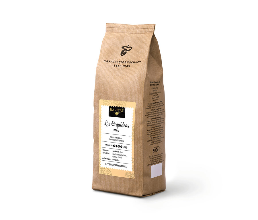 Eine 500-Gramm-Packung »Las Orquídeas Peru«-Kaffeebohnen steht auf einer weißen Oberfläche.