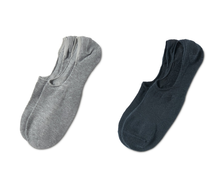 Zwei Paar Sport-Füßlinge auf weißem Hintergrund.